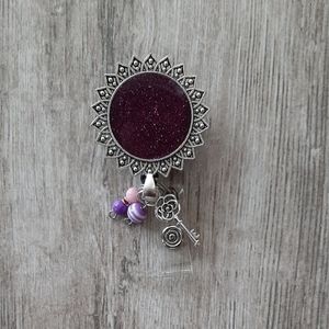 Purple glitter pendant badge reel
